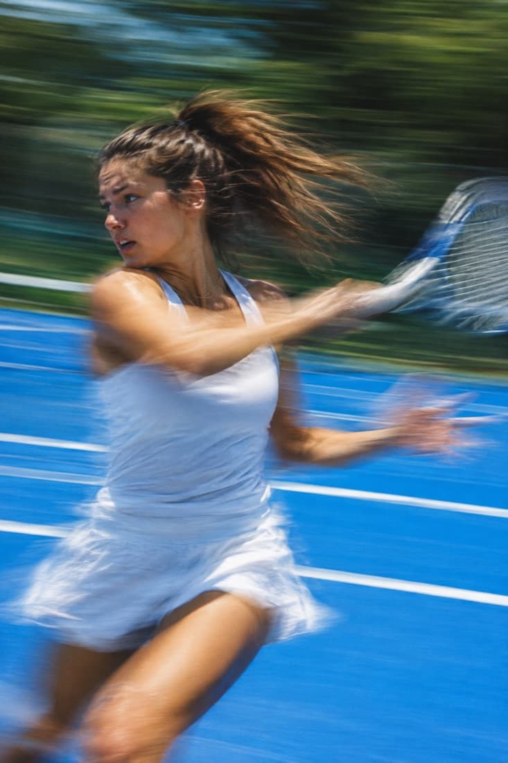Forehand on a blue hard court